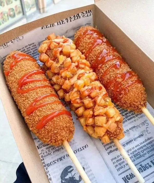 Corn dog mix packaging with corn dogs displayed